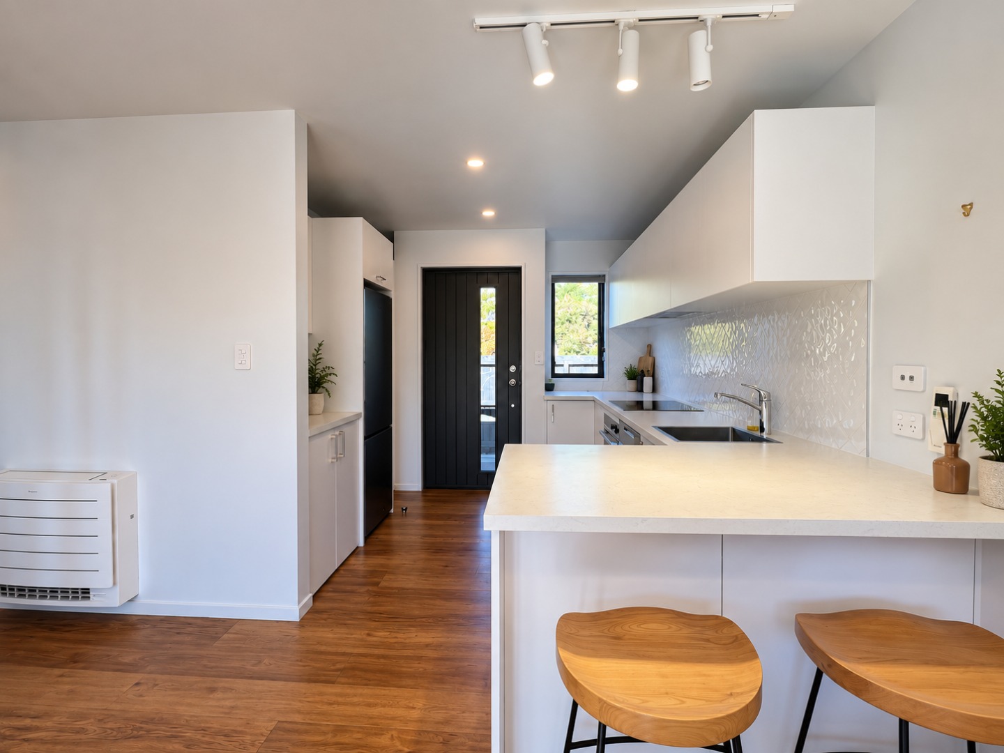 Bright Minimalist Kitchen with Warm Wood Accents