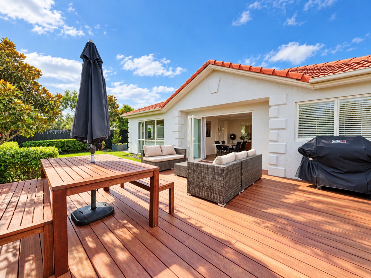 Sunny Suburban Patio with Open Living Space