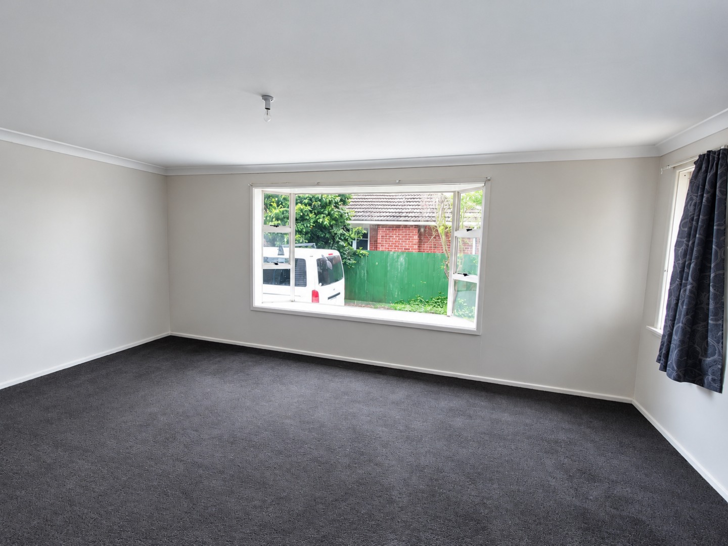 Bright Empty Living Room with Garden View