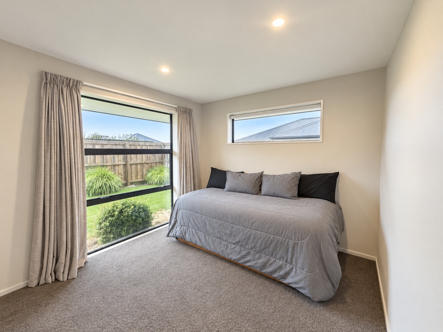 Bright Minimalist Bedroom with Garden View