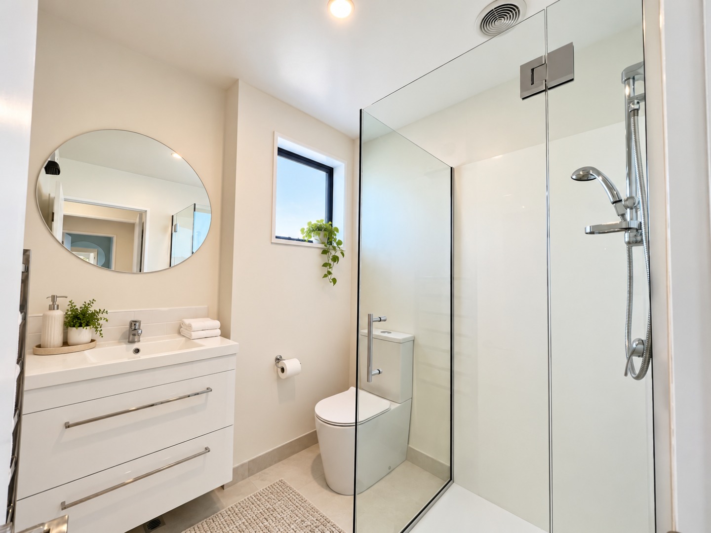 Bright Minimalist Bathroom with Greenery