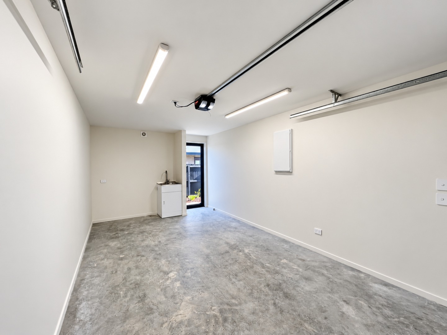 Modern Empty Garage with Utility Sink