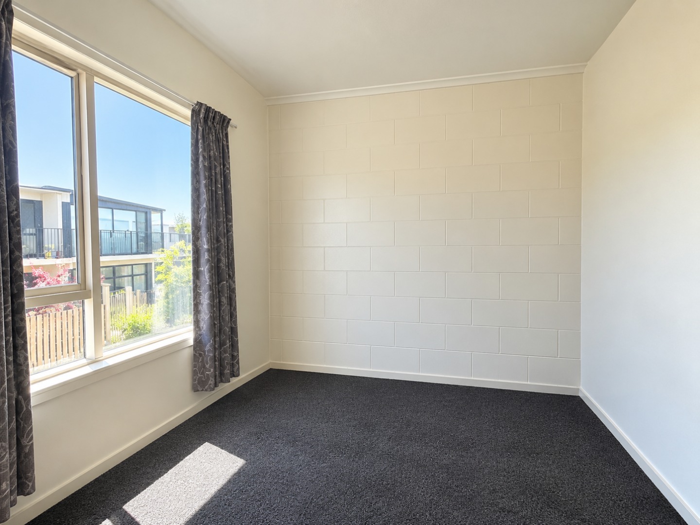 Bright Empty Room with Window Views