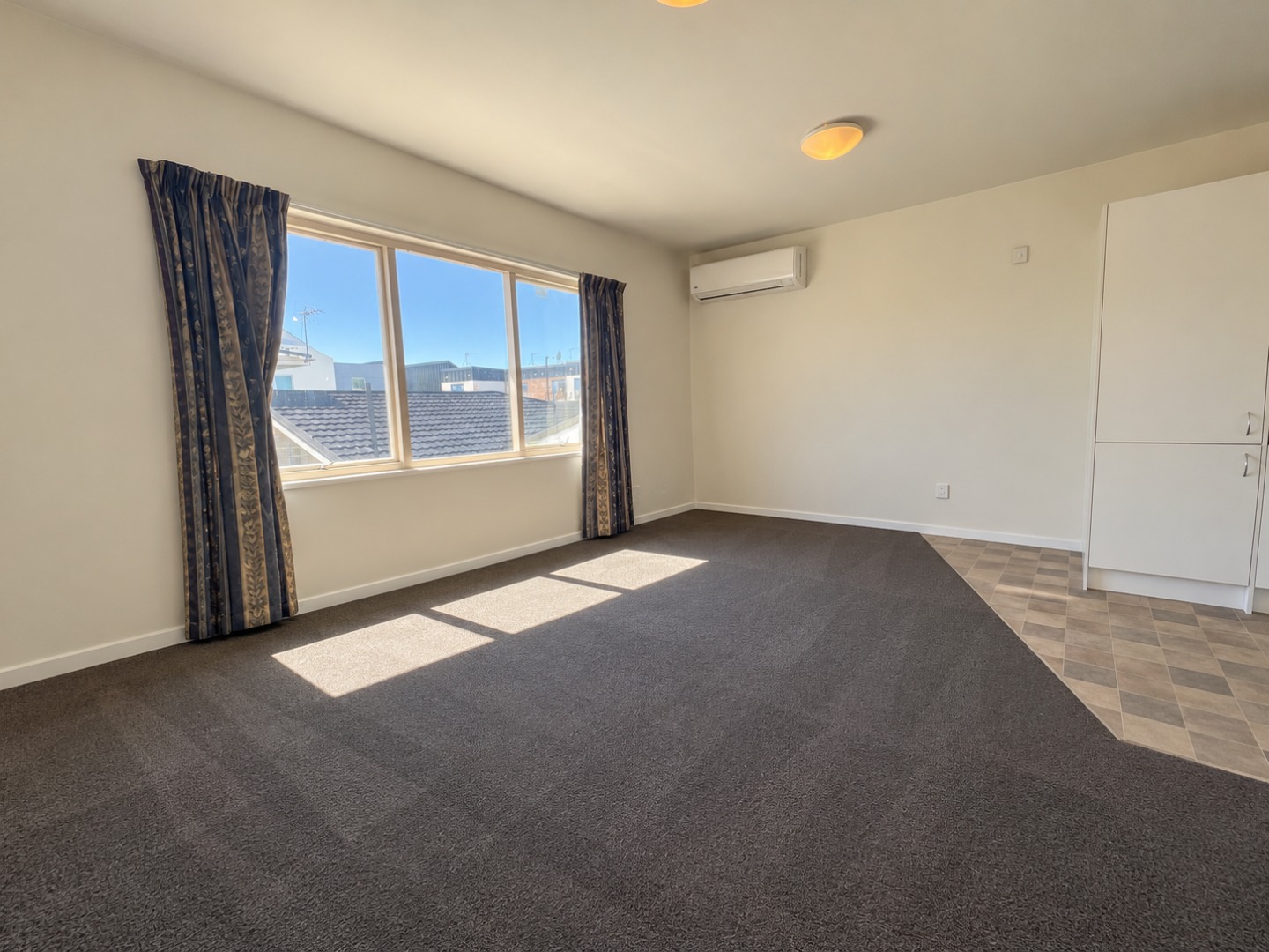 Empty Sunlit Apartment Interior