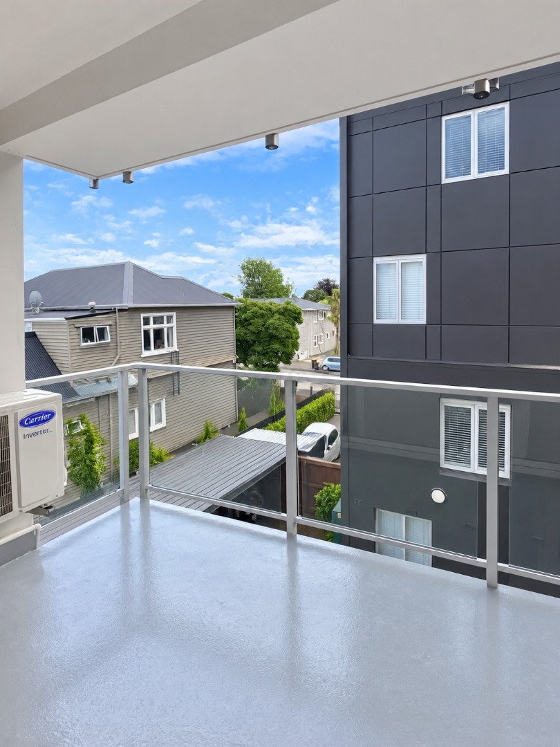 Modern Balcony Overlooking Urban Homes