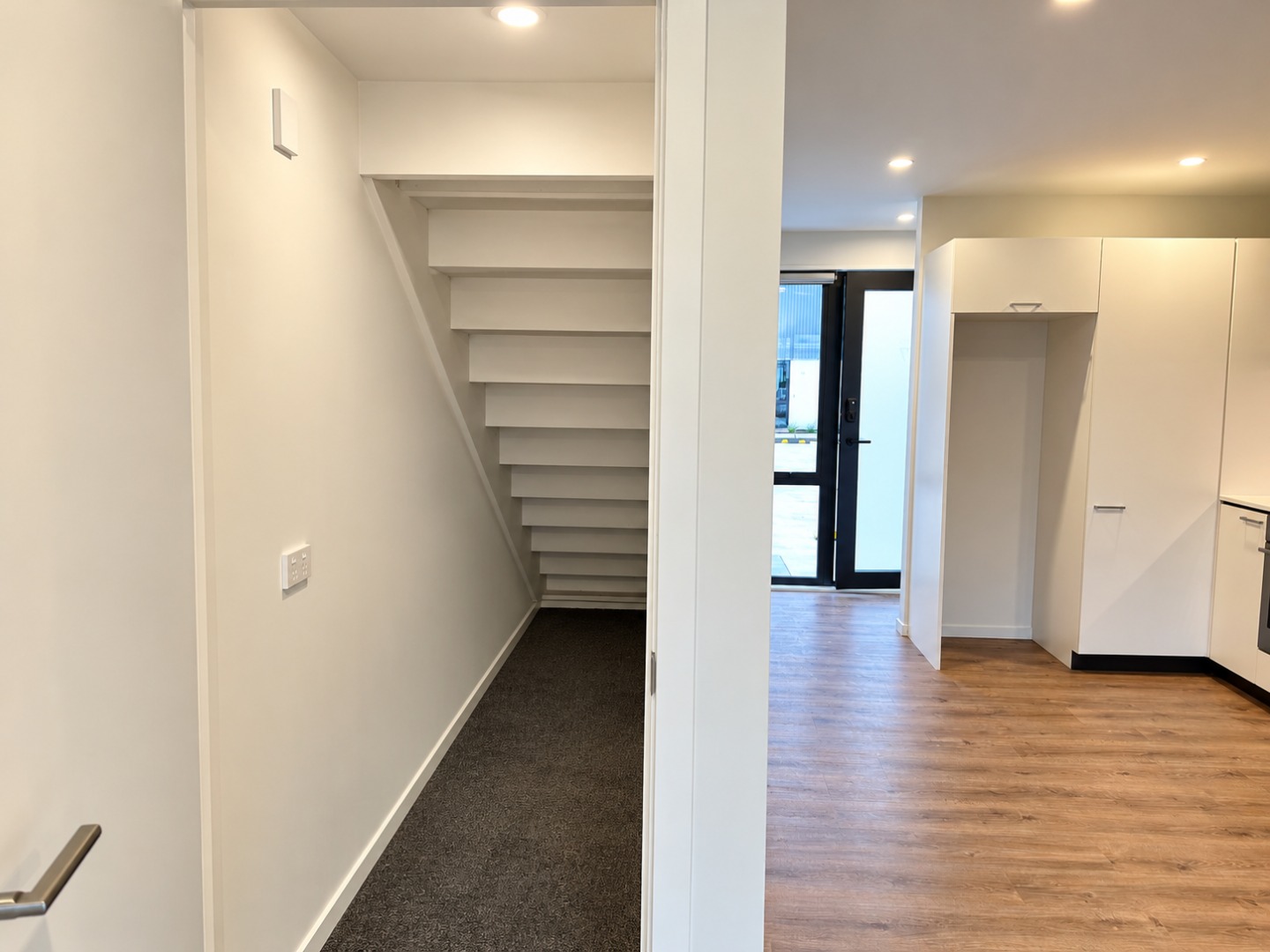 Modern Under-Stair Storage and Kitchen Entry