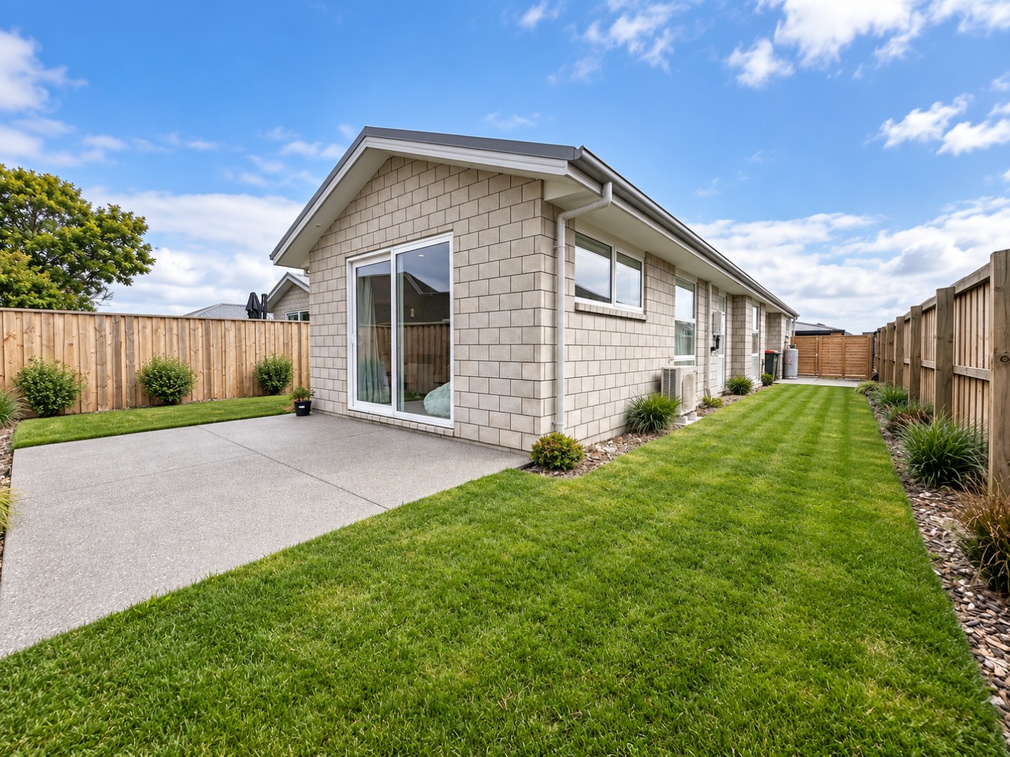 Modern Home with Lush Backyard Lawn (1)