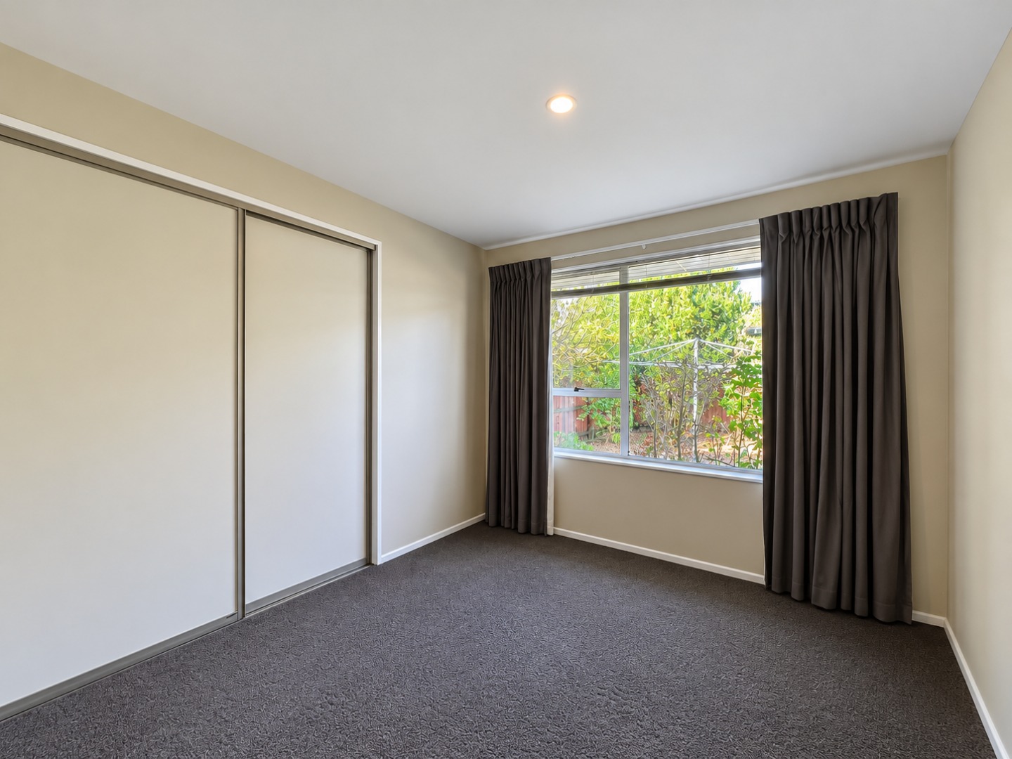 Neutral Bedroom with Garden View