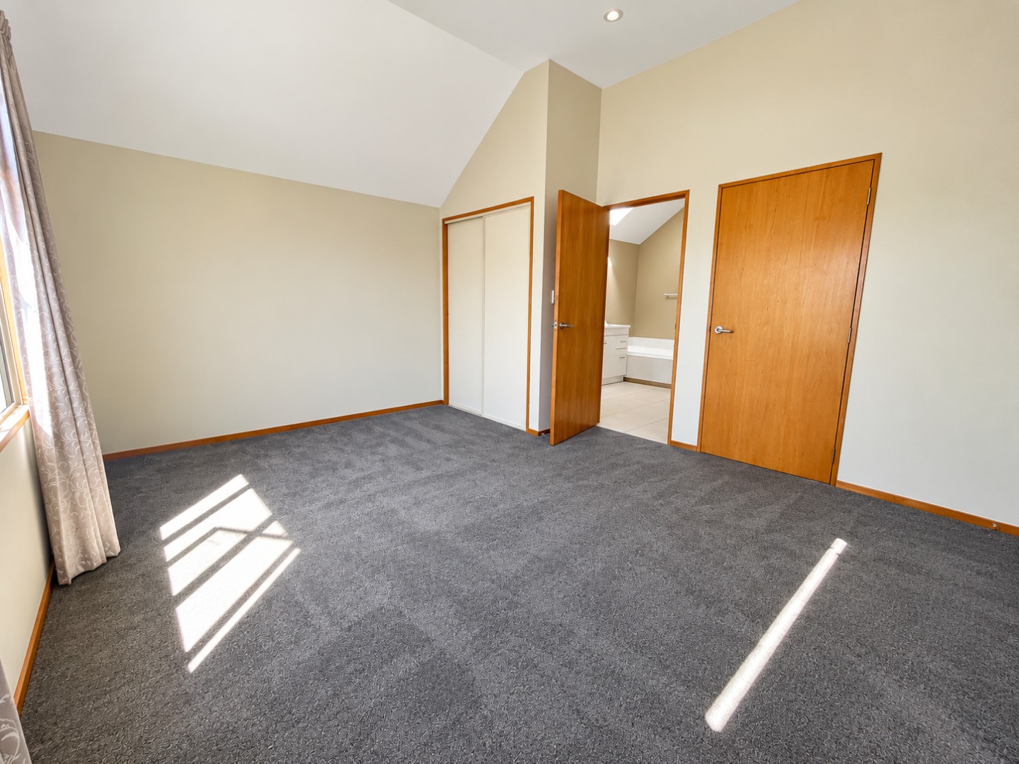 Sunlit Minimalist Bedroom with Ensuite (1)